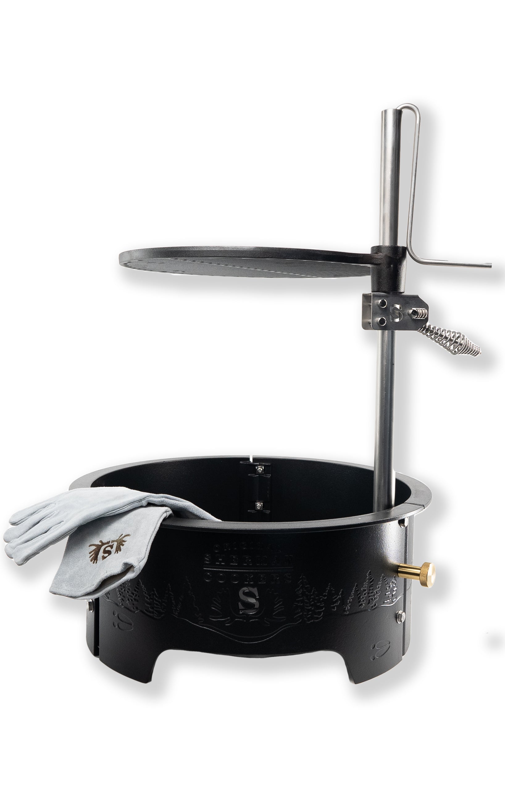 A black Sherman Cooker with a fire pit, cooking grate, vertical pole, and heat resistant gloves.
